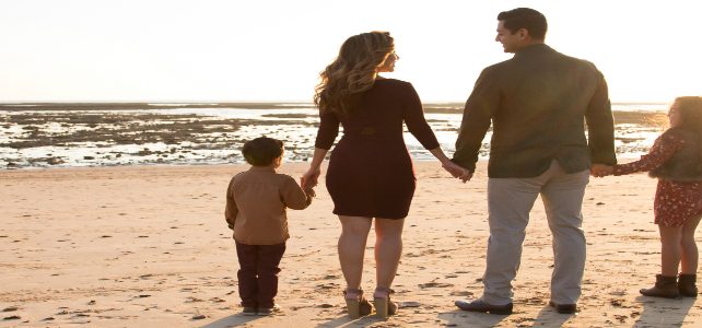 CYFD Abuse and Neglect Cases a family holding hands, connected.